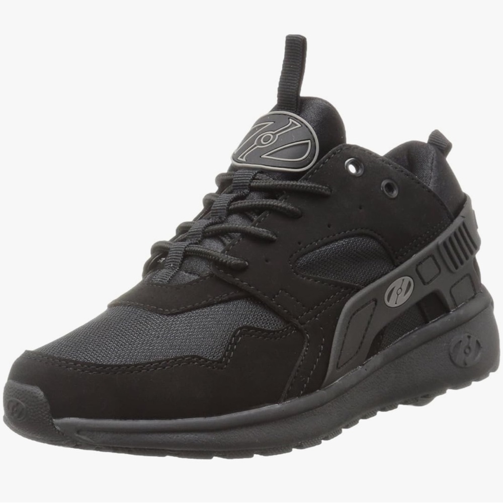 Black like new Heelys kids’ size 4. Has wheels and tool as shown in pictures.